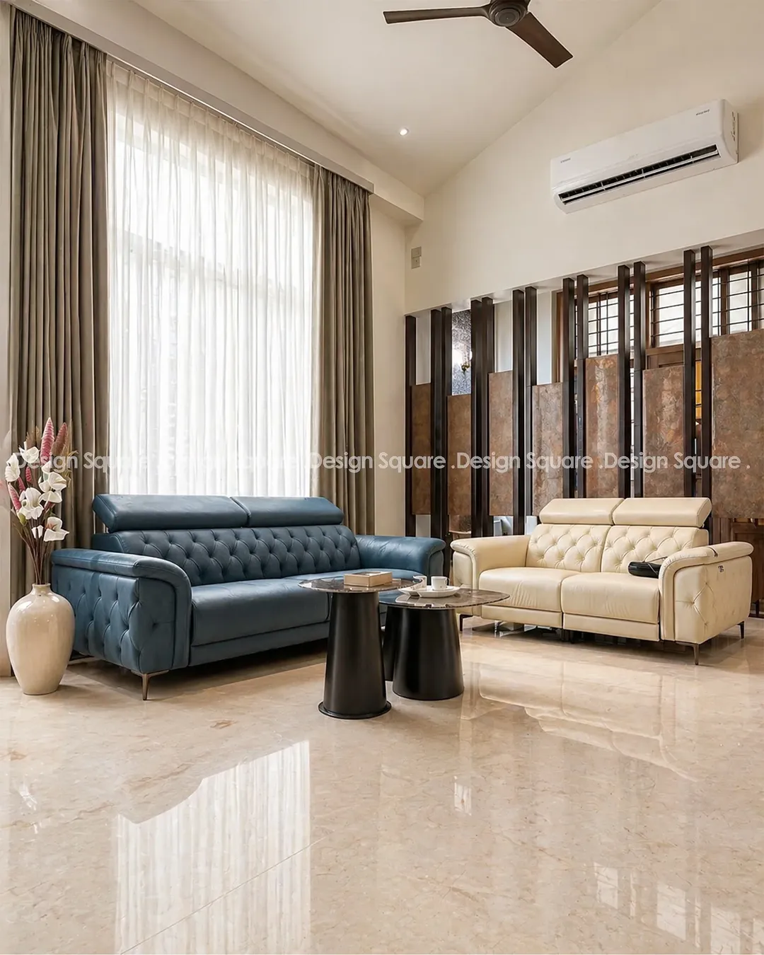 Living room with blue and cream leather sofas, Mangalore residence